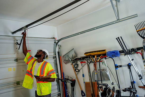 Professional Garage Door Panel Replacement technician working in Jackpot, NV